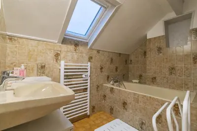 Salle de bains dans l'établissement Gîte Bernard