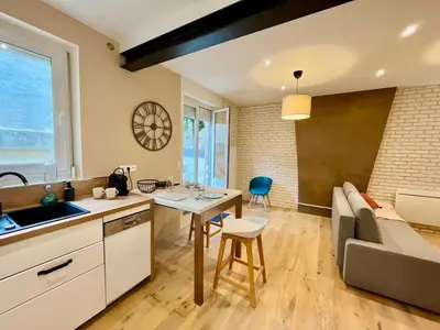 Cuisine ou kitchenette dans l'établissement Arthys - Un extérieur au centre-ville