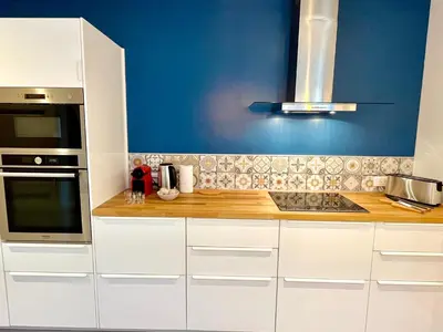 Cuisine ou kitchenette dans l'établissement Le Jardin Des Sacres - HyperCentre Cathédrale
