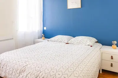 Un ou plusieurs lits dans un hébergement de l'établissement Maison 'Millésime' spacieuse et confortable