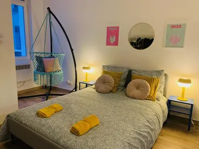 Un ou plusieurs lits dans un hébergement de l'établissement cocooning modern design studio