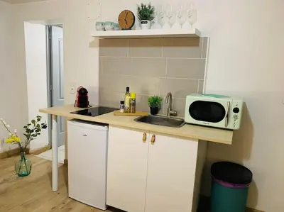 Cuisine ou kitchenette dans l'établissement cocooning modern design studio