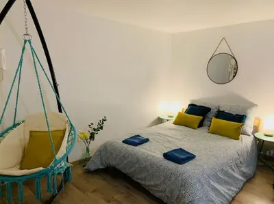 Un ou plusieurs lits dans un hébergement de l'établissement cocooning modern design studio