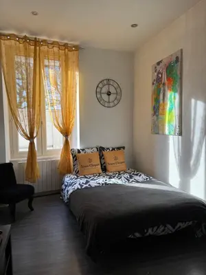 Un ou plusieurs lits dans un hébergement de l'établissement Pétille en champagne - 1 chambre - Terrasse
