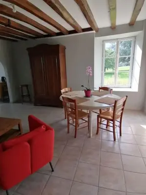 Coin salon dans l'établissement Charmant gîte : Les flambeaux