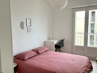 Un ou plusieurs lits dans un hébergement de l'établissement L' escapade Rémoise - Beau 4 pièces refait à neuf