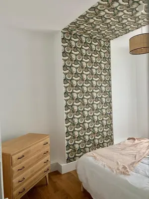 Un ou plusieurs lits dans un hébergement de l'établissement Champagne! Appartement spacieux Reims centre