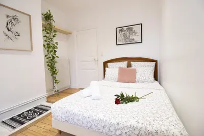 Un ou plusieurs lits dans un hébergement de l'établissement 2 chambres, proche hyper centre