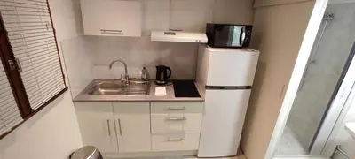 Cuisine ou kitchenette dans l'établissement Studette Rémoise