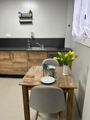 Cuisine ou kitchenette dans l'établissement Les Chambres de Campagne