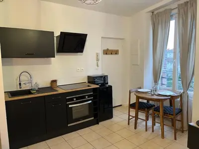 Cuisine ou kitchenette dans l'établissement Le Clos