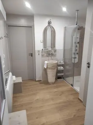 Salle de bains dans l'établissement Aux Charmes de la Vallée