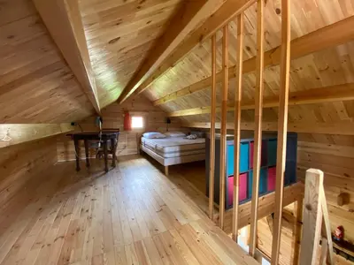 Un ou plusieurs lits dans un hébergement de l'établissement Chalet des coteaux