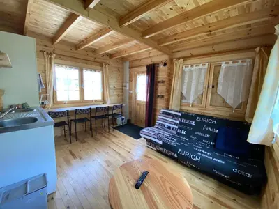 Coin salon dans l'établissement Chalet des coteaux