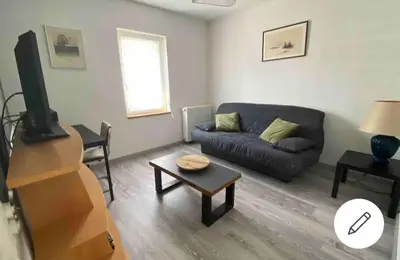 Télévision ou salle de divertissement dans l'établissement Appartement proche basilique Saint Rémi