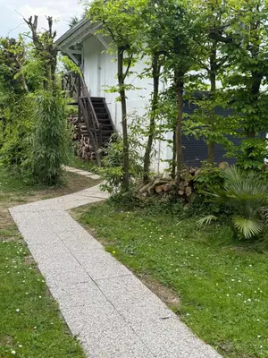 Jardin de l'établissement Chalet romantique Terrasse privée Île aux Palmiers