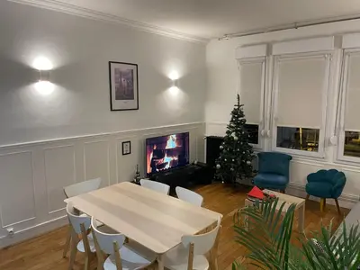 Coin salon dans l'établissement Le cinquante-deux appartement de Charme