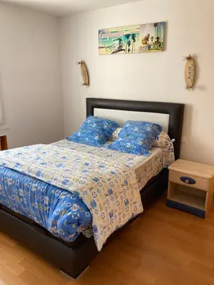 Un ou plusieurs lits dans un hébergement de l'établissement Chez Bernard pavillon proche Disneyland et Paris
