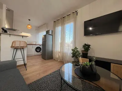 Cuisine ou kitchenette dans l'établissement Appartement proche Disneyland