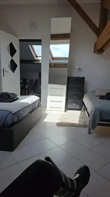 Un ou plusieurs lits dans un hébergement de l'établissement Super Appartement 3 pièces avec Piscine