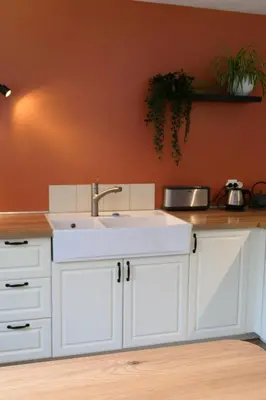 Cuisine ou kitchenette dans l'établissement Lodge de la Vigneronne