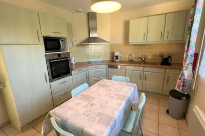 Cuisine ou kitchenette dans l'établissement Maison avec véranda - Gîte de l'Arbrisseau