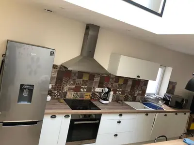 Cuisine ou kitchenette dans l'établissement Une maison agréable pour se détendre