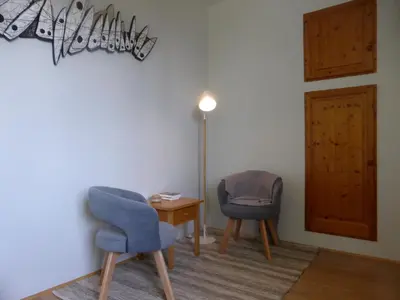 Coin salon dans l'établissement Les Oiseaux de Passage
