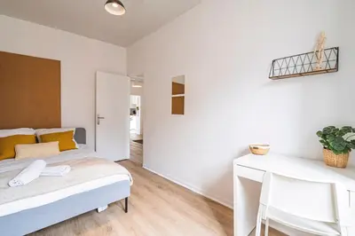 Un ou plusieurs lits dans un hébergement de l'établissement Le Zola - charmant 2 chambres - centre gare
