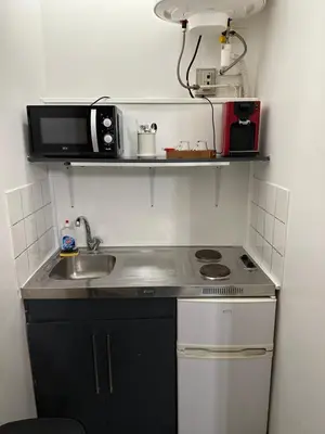 Cuisine ou kitchenette dans l'établissement Le cocon
