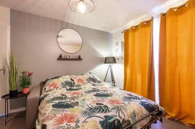Un ou plusieurs lits dans un hébergement de l'établissement The Sunshine- Appart cosy proche Paris-Disney avec Parking privé dans résidence
