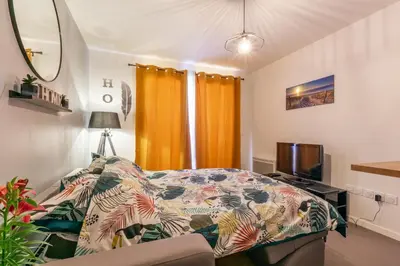 Un ou plusieurs lits dans un hébergement de l'établissement The Sunshine- Appart cosy proche Paris-Disney avec Parking privé dans résidence