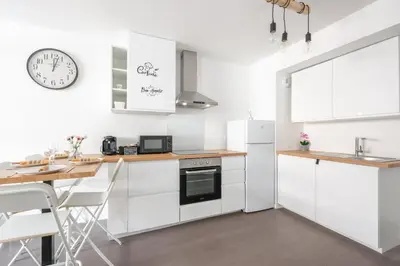 Cuisine ou kitchenette dans l'établissement The Sunshine- Appart cosy proche Paris-Disney avec Parking privé dans résidence