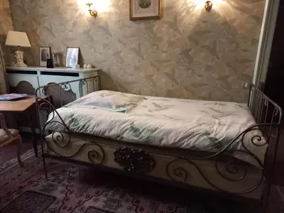 Un ou plusieurs lits dans un hébergement de l'établissement Location meublé de tourisme La Rose des Fables