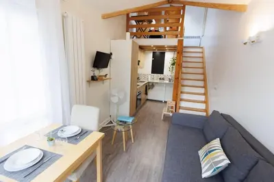 Cuisine ou kitchenette dans l'établissement L'appart Cosy -Proche Disney