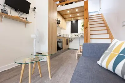 Cuisine ou kitchenette dans l'établissement L'appart Cosy -Proche Disney