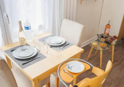 Coin salon dans l'établissement L'appart Cosy -Proche Disney