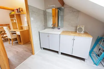 Cuisine ou kitchenette dans l'établissement L'appart Cosy -Proche Disney