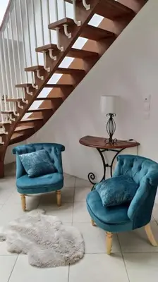 Coin salon dans l'établissement Gîte aux trois suites parentales et son jacuzzi