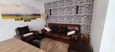 Coin salon dans l'établissement MYL Bulles