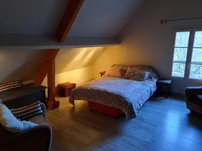 Un ou plusieurs lits dans un hébergement de l'établissement Chambre d'hôtes Bien-être