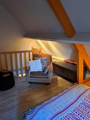 Un ou plusieurs lits dans un hébergement de l'établissement Chambre d'hôtes Bien-être