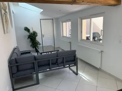 Coin salon dans l'établissement Maison de 1 a 8 personnes entièrement rénovée