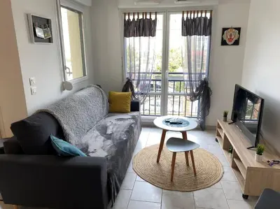 Télévision ou salle de divertissement dans l'établissement Appartement Avenue de Champagne