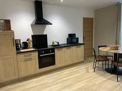 Cuisine ou kitchenette dans l'établissement Gite du Pavillon