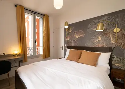 Un ou plusieurs lits dans un hébergement de l'établissement Villa Forestière Appart Le Ginkgo