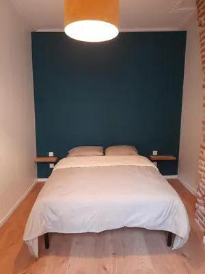 Un ou plusieurs lits dans un hébergement de l'établissement Appartement Atypique