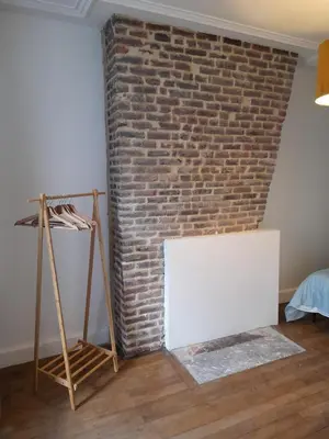 Un ou plusieurs lits dans un hébergement de l'établissement Appartement Atypique