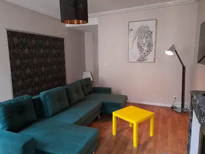 Coin salon dans l'établissement Appartement Atypique