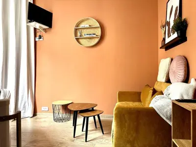 Télévision ou salle de divertissement dans l'établissement Terra Cotta # REIMS
